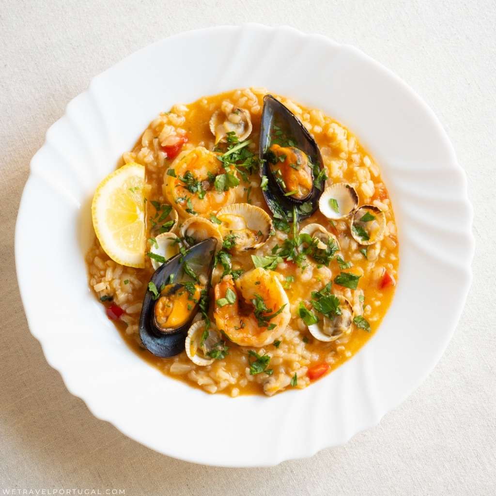 a plate of seafood rice