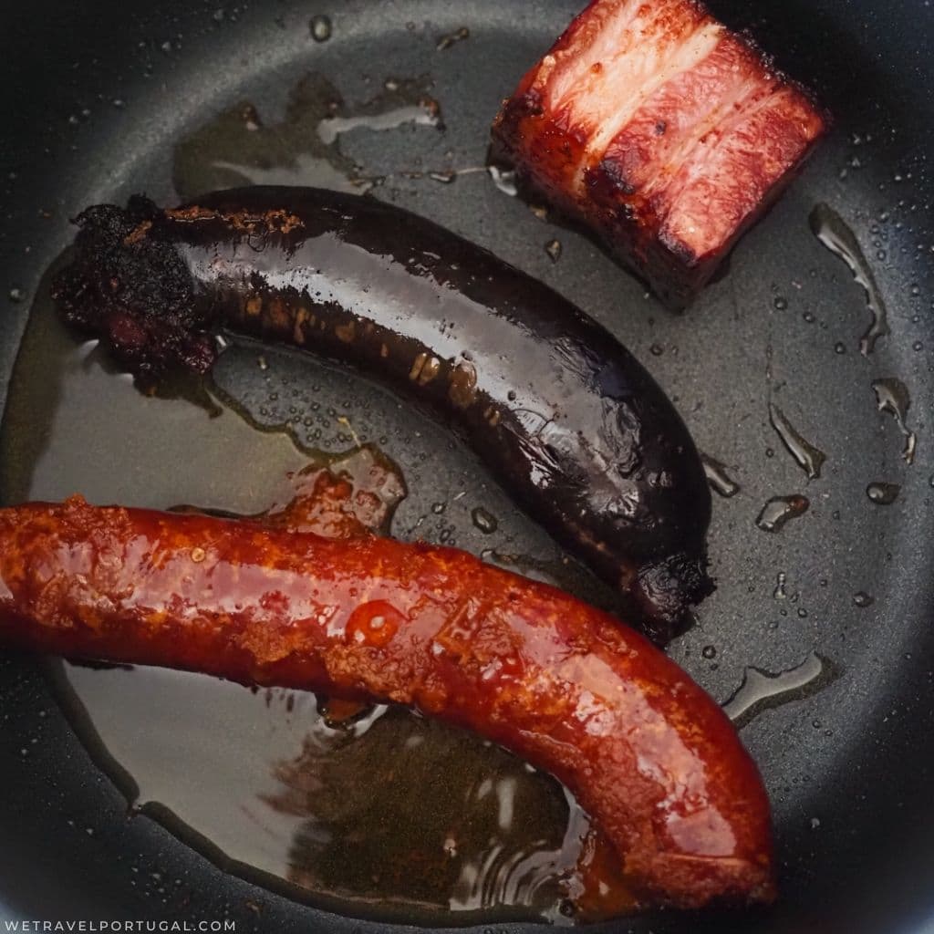 typical sausages frying